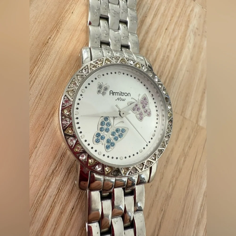 Armitron Now ladies butterfly silver tone watch NEW BATTERY